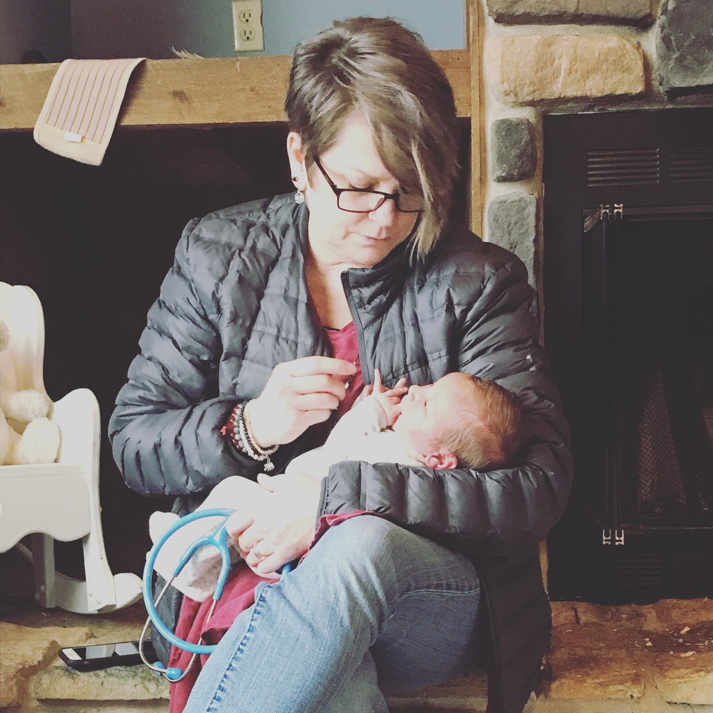 Midwife Doran Richards holding baby